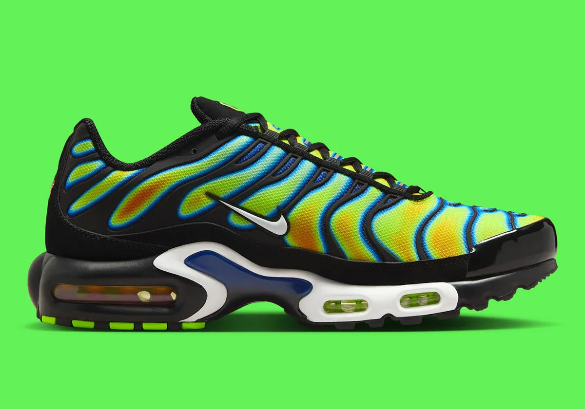 Nike Air Max Plus Heat Map, sneaker TN jaune, verte et bleue avec effet thermique, renforts noirs et unités Air visibles.