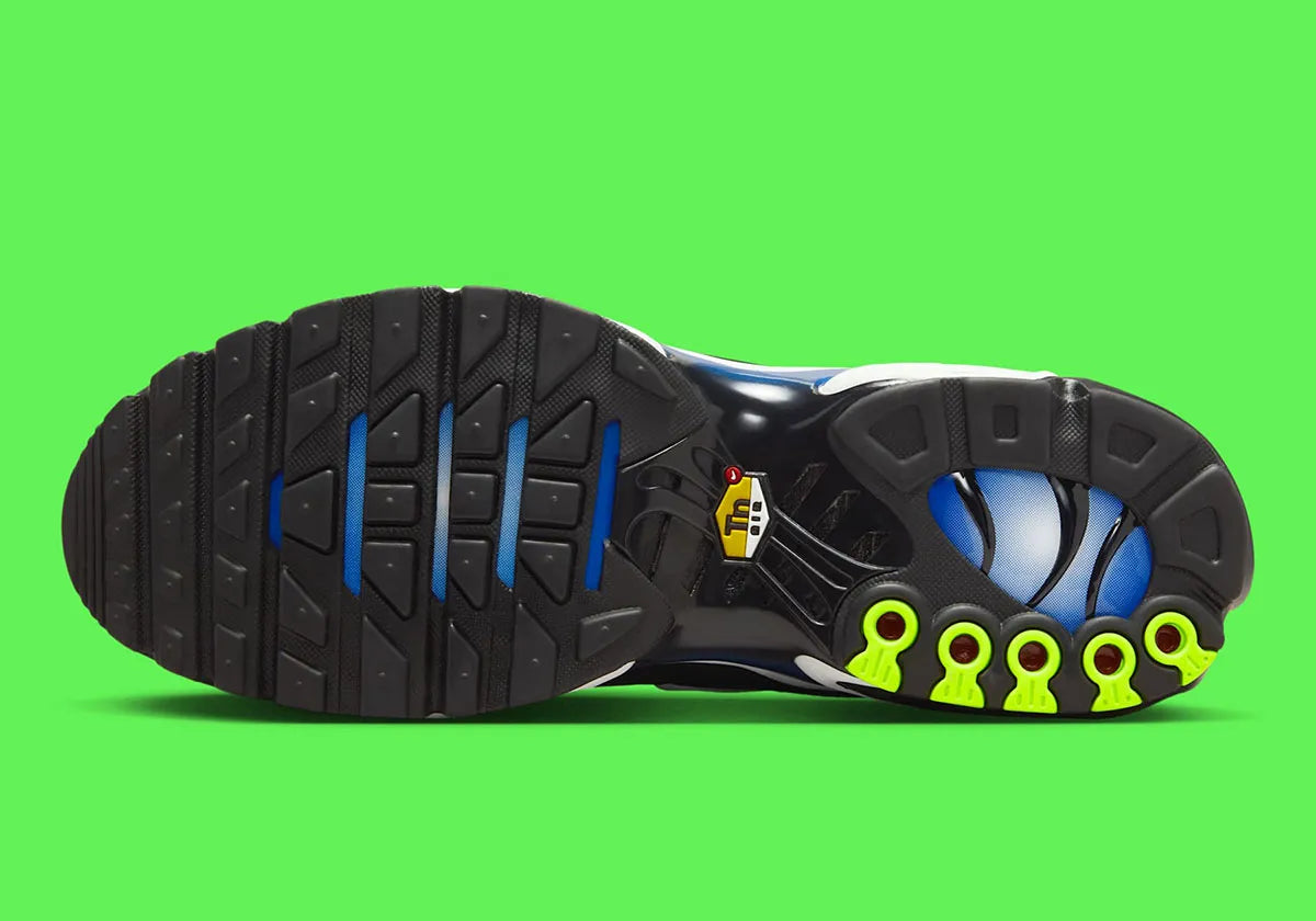 Nike Air Max Plus Heat Map, sneaker TN jaune, verte et bleue avec effet thermique, renforts noirs et unités Air visibles.
