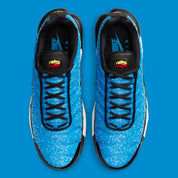 Image de la Nike Air Max Plus Naples, sneaker TN en mesh dégradé bleu, orange et jaune doré, avec cages TPU ondulées, mini Swoosh contrasté et amorti Tuned Air