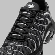 Sneakers Nike Air Max Plus Premium noires avec détails Reflective Silver en mesh technique et cage TPU avec amorti Tuned Air visible