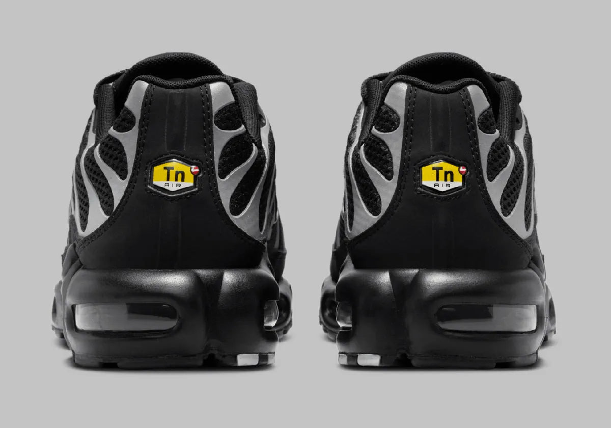 Sneakers Nike Air Max Plus Premium noires avec détails Reflective Silver en mesh technique et cage TPU avec amorti Tuned Air visible