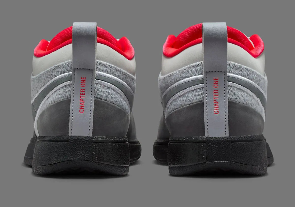 Nike Book 1 Air Max 95 Solar Red avec tige en dégradé de gris, accents rouges, détails inspirés de la Air Max 95 et amorti Zoom Air au talon.