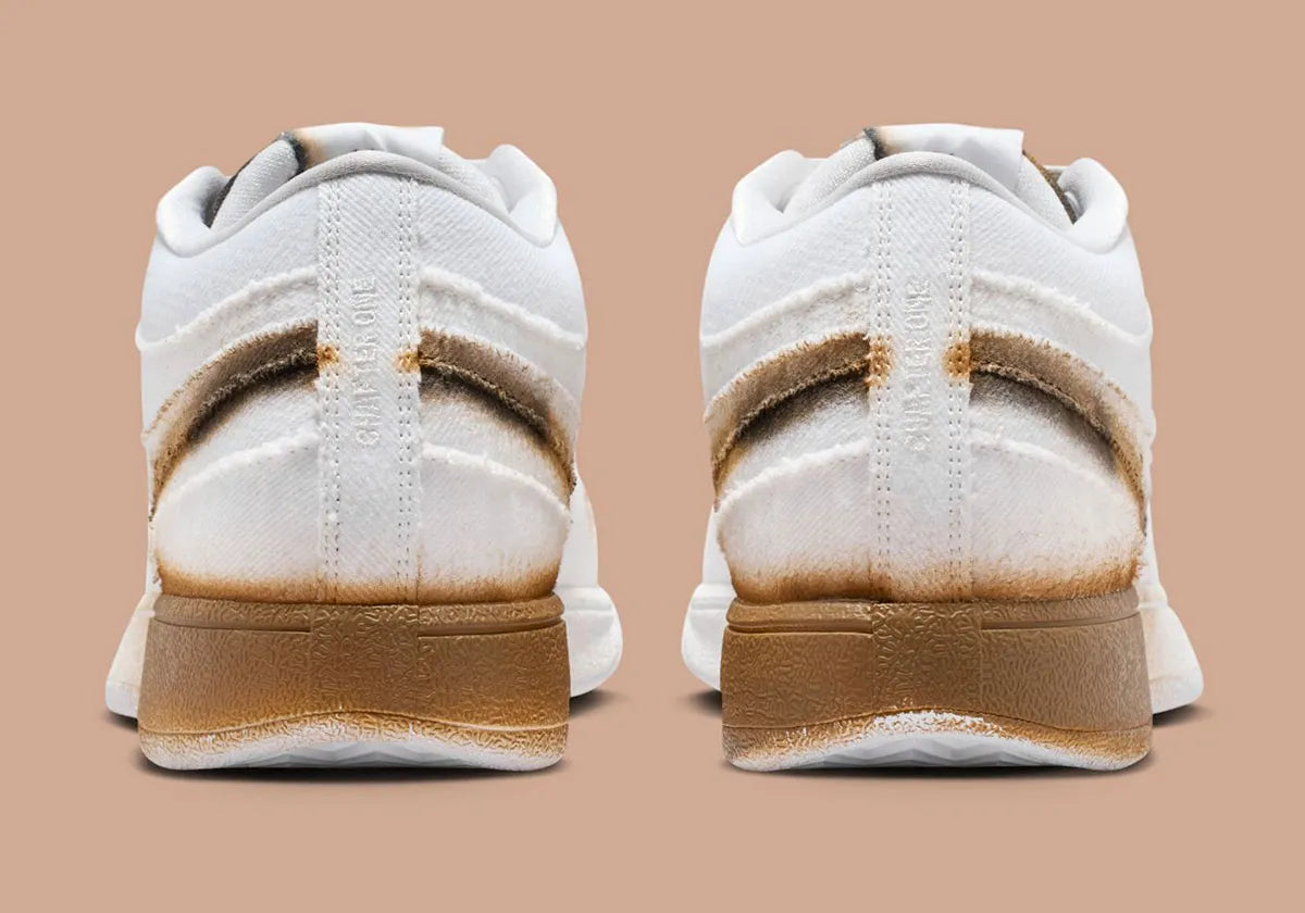 Nike Book 1 Torched à silhouette basse, avec tige multicouche aux tons chauds contrastés, empiècements structurés, amorti Zoom Air et semelle extérieure adhérente.
