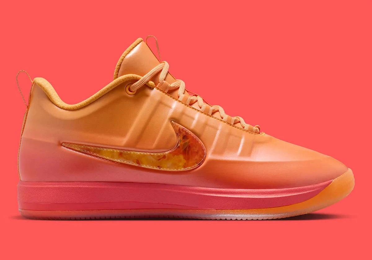 Sneakers Nike Book 2 en mesh respirant avec renforts synthétiques, coloris orange et violet Phoenix, amorti performance basketball.