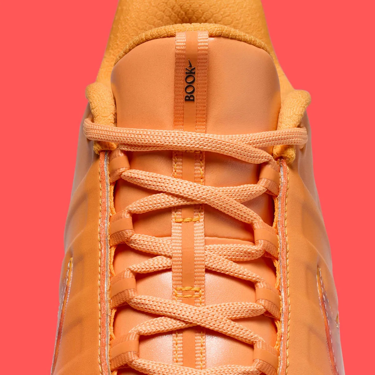 Sneakers Nike Book 2 en mesh respirant avec renforts synthétiques, coloris orange et violet Phoenix, amorti performance basketball.