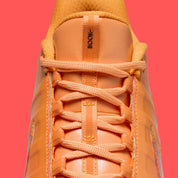 Sneakers Nike Book 2 en mesh respirant avec renforts synthétiques, coloris orange et violet Phoenix, amorti performance basketball.