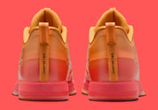 Sneakers Nike Book 2 en mesh respirant avec renforts synthétiques, coloris orange et violet Phoenix, amorti performance basketball.