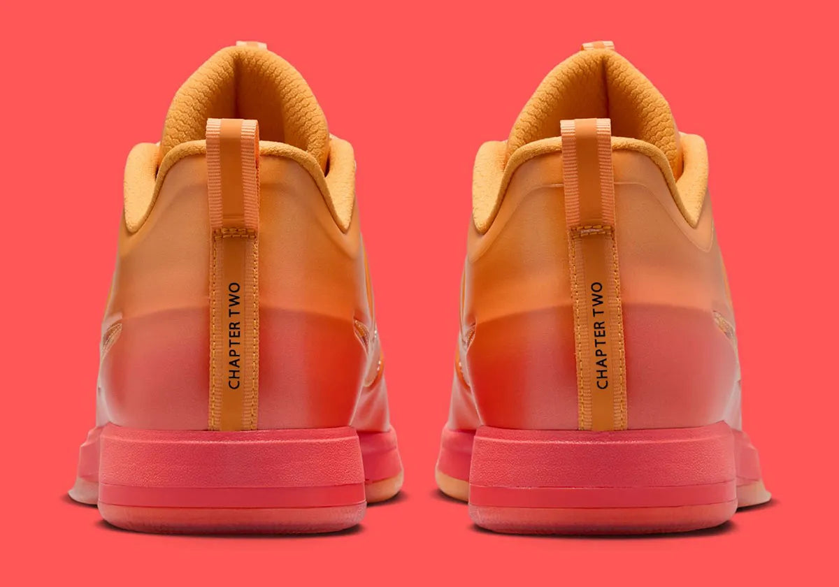 Sneakers Nike Book 2 en mesh respirant avec renforts synthétiques, coloris orange et violet Phoenix, amorti performance basketball.