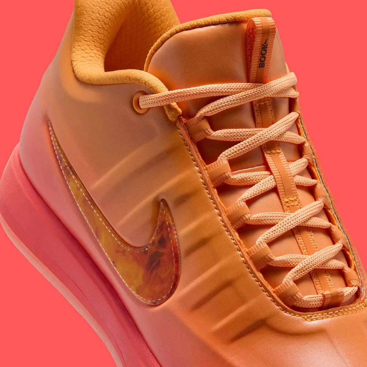 Sneakers Nike Book 2 en mesh respirant avec renforts synthétiques, coloris orange et violet Phoenix, amorti performance basketball.