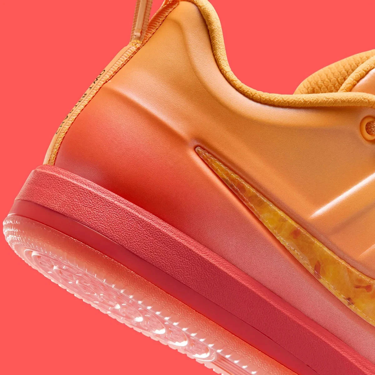 Sneakers Nike Book 2 en mesh respirant avec renforts synthétiques, coloris orange et violet Phoenix, amorti performance basketball.