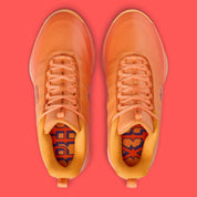 Sneakers Nike Book 2 en mesh respirant avec renforts synthétiques, coloris orange et violet Phoenix, amorti performance basketball.