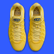 Nike Caitlin 1 Warning Code IH7423-700 jaune Yellow Zest et Racer Blue avec empeigne Opticast, Air Zoom Turbo et logo Caitlin Clark.