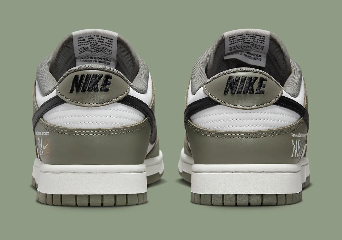 Nike Dunk Low NBA Paris, sneaker Nike Dunk Low inspirée de la NBA et de Paris avec une silhouette emblématique et des finitions premium vue de profil. 