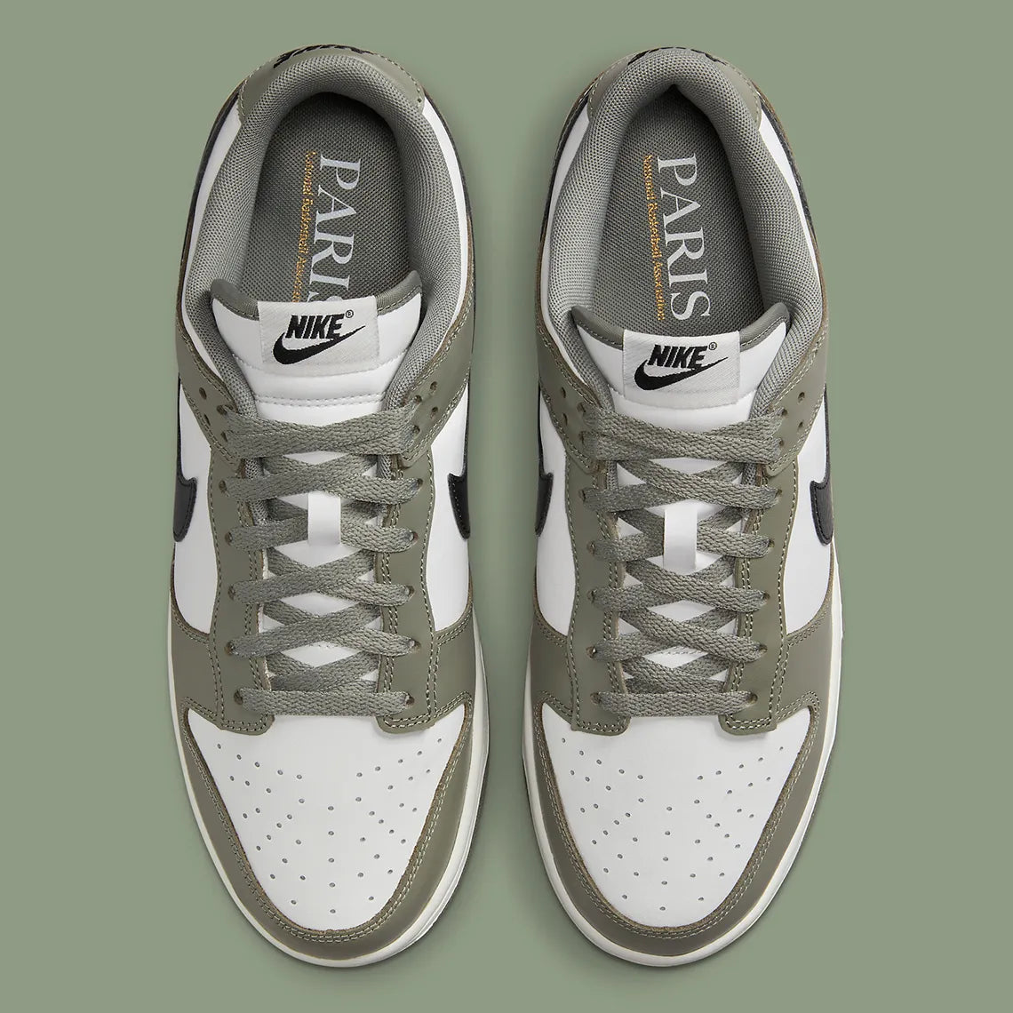 Nike Dunk Low NBA Paris, sneaker Nike Dunk Low inspirée de la NBA et de Paris avec une silhouette emblématique et des finitions premium vue de profil. 