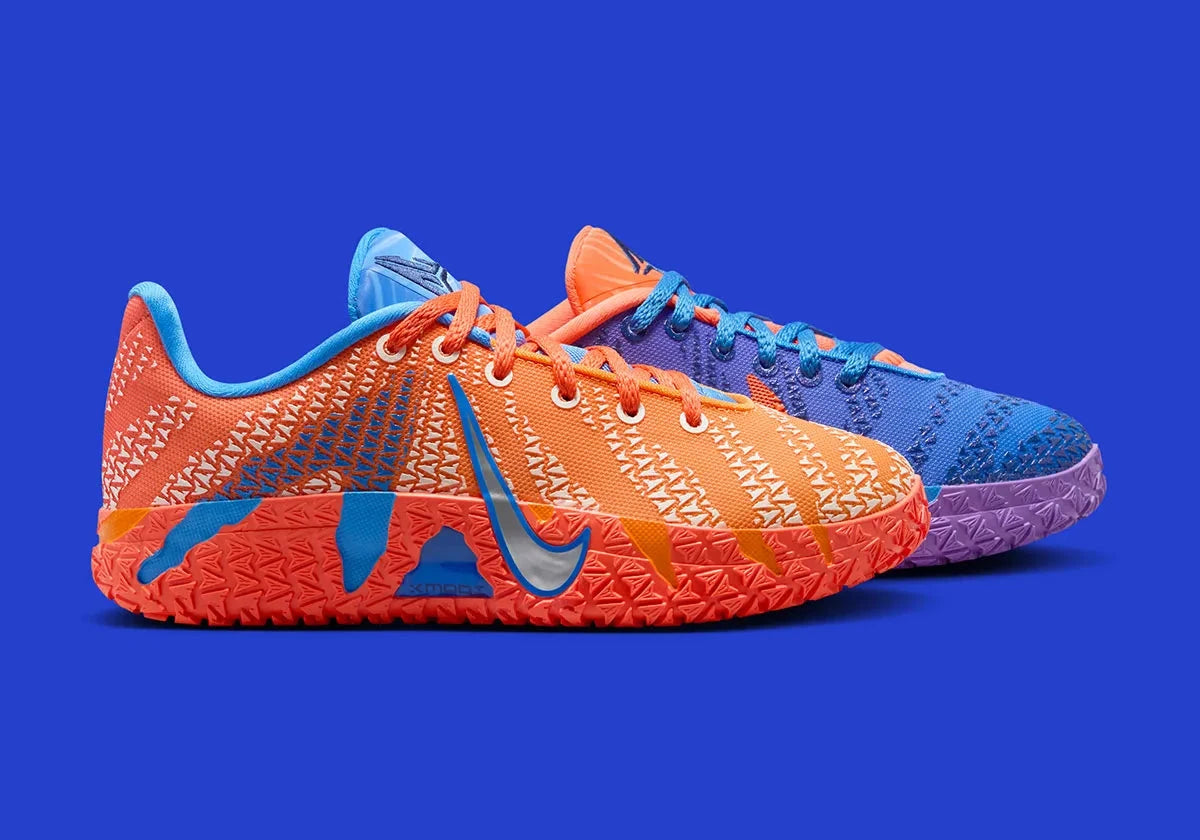 Nike Ja 3 Blue Crystal avec tige textile bleue, accents Turf Orange, Midnight Navy et Metallic Silver, amorti réactif et semelle en caoutchouc adhérente.
