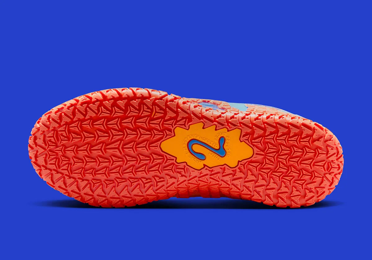 Nike Ja 3 Blue Crystal avec tige textile bleue, accents Turf Orange, Midnight Navy et Metallic Silver, amorti réactif et semelle en caoutchouc adhérente.