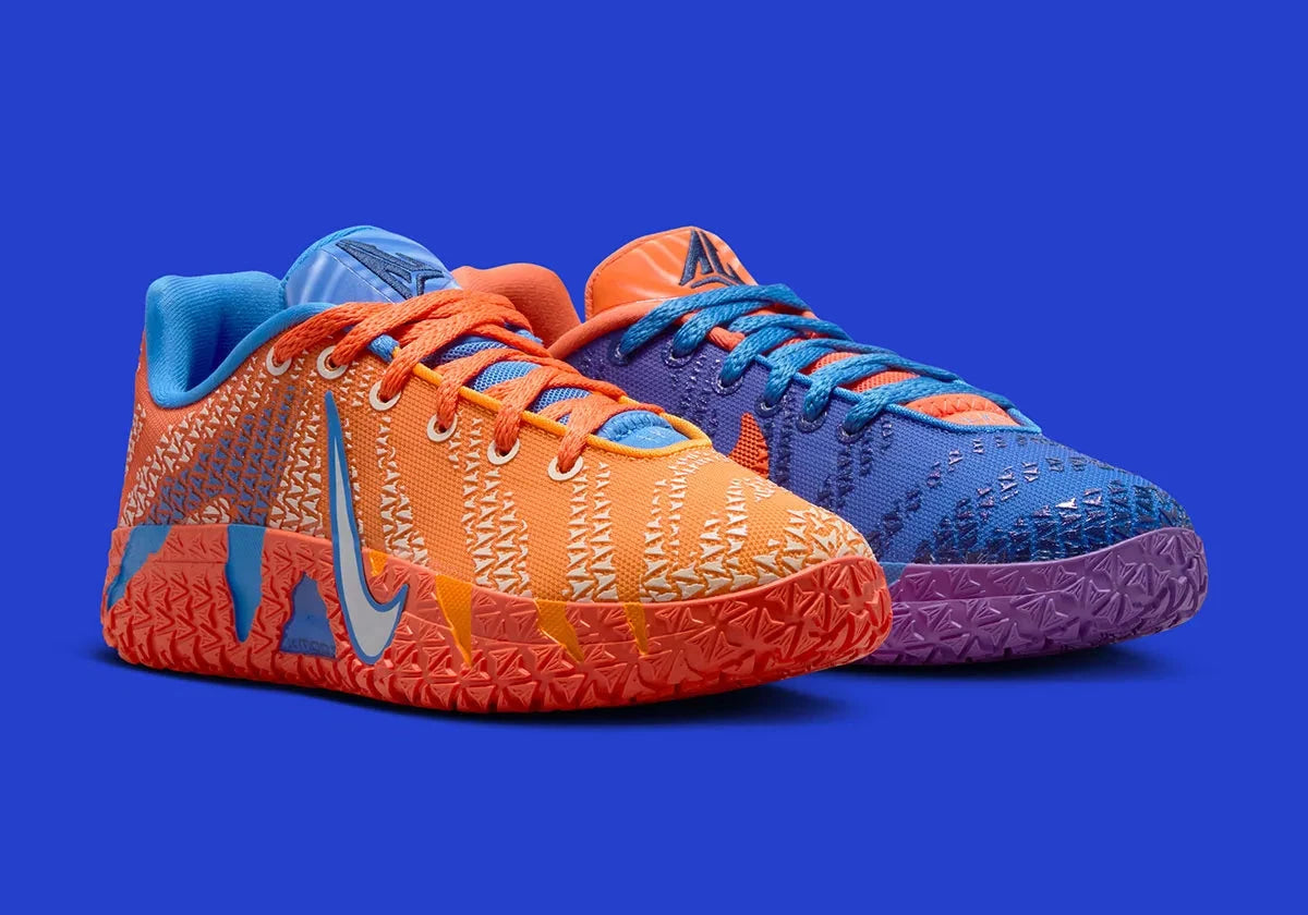 Nike Ja 3 Blue Crystal avec tige textile bleue, accents Turf Orange, Midnight Navy et Metallic Silver, amorti réactif et semelle en caoutchouc adhérente.