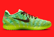 Nike Ja 3 Zombie GS à silhouette basketball basse, avec tige textile sombre, accents contrastés, renforts structurés, amorti confortable et semelle en caoutchouc adhérente.