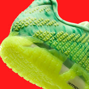 Nike Ja 3 Zombie en mesh vert et noir avec détails graphiques et amorti réactif pour performance basketball. Zoom arrière 