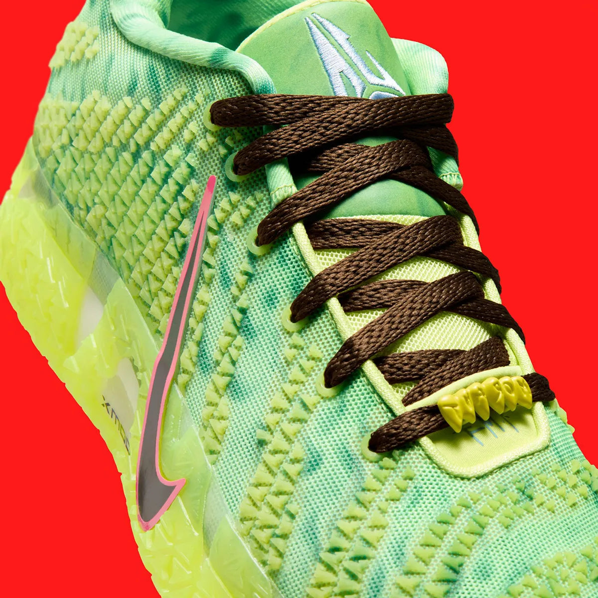 Nike Ja 3 Zombie en mesh vert et noir avec détails graphiques et amorti réactif pour performance basketball. Zoom avant 