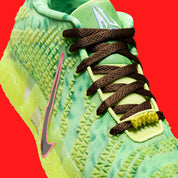 Nike Ja 3 Zombie en mesh vert et noir avec détails graphiques et amorti réactif pour performance basketball. Zoom avant 