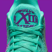 Sneakers Nike Ja 3 Twelve Time en mesh technique avec semelle réactive, traction multidirectionnelle et design basketball moderne inspiré de Ja Morant.Vue zoomer de face 