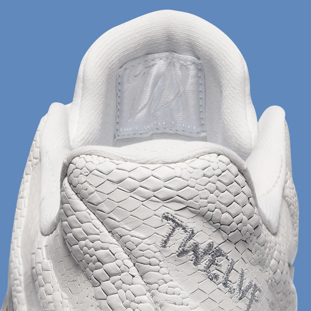 Nike Ja 3 White Label, chaussures de basketball signature Ja Morant avec tige respirante, amorti performant et excellente adhérence.