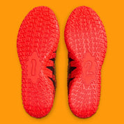 Vue sur les semelles de la sneakers Nike Ja 3 Year Of The Horse rouges et dorées en mesh technique avec amorti Zoom Air et design symbolique premium