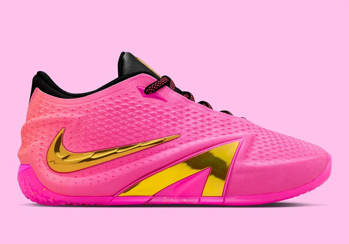 Nike Ja 4 Rise, chaussure de basketball signature Ja Morant avec amorti Cushlon 3.0, système JA-Frame et coloris dégradé Rise aux détails dorés.