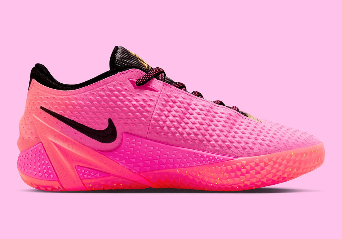 Nike Ja 4 Rise, chaussure de basketball signature Ja Morant avec amorti Cushlon 3.0, système JA-Frame et coloris dégradé Rise aux détails dorés.