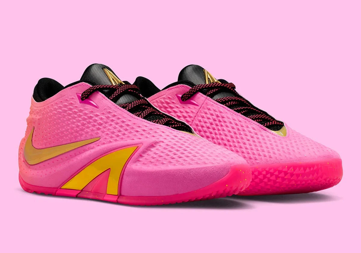Nike Ja 4 Rise, chaussure de basketball signature Ja Morant avec amorti Cushlon 3.0, système JA-Frame et coloris dégradé Rise aux détails dorés.