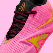 Nike Ja 4 Rise, chaussure de basketball signature Ja Morant avec amorti Cushlon 3.0, système JA-Frame et coloris dégradé Rise aux détails dorés.