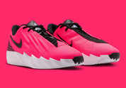 Nike Ja Twelve Time Solar rouge avec détails noirs et bleu clair, tige moulée et semelle basketball pensée pour les changements de direction.