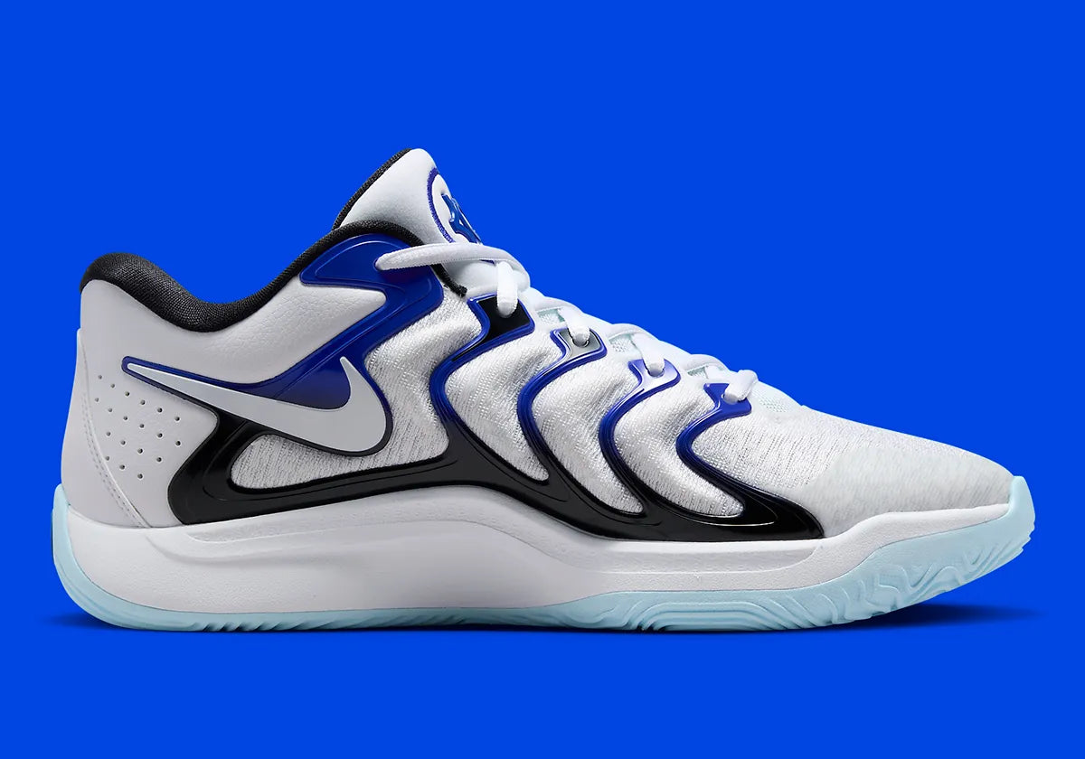 Nike KD 17 Penny avec tige en mesh technique, cage en TPU, amorti Zoom Air à l'avant-pied, Air Strobel sur toute la longueur et détails inspirés de Penny Hardaway.