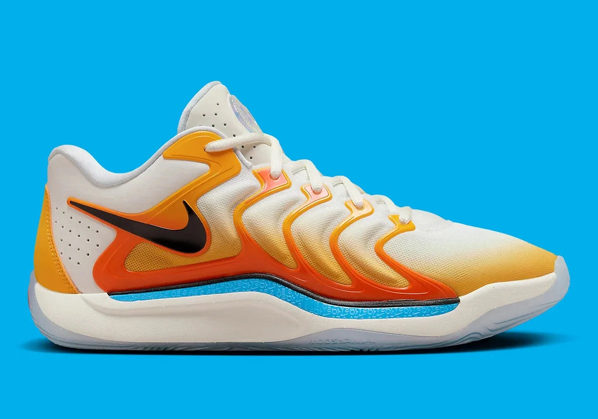 Nike KD 17 Sunrise avec tige en mesh technique aux tons inspirés du lever du soleil, cage en TPU, amorti Zoom Air, Air Strobel et semelle extérieure à traction multidirectionnelle.