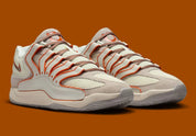 Sneaker de basketball Nike KD 18 Rise en mesh technique multicouche avec amorti Zoom Air et semelle à traction multidirectionnelle.