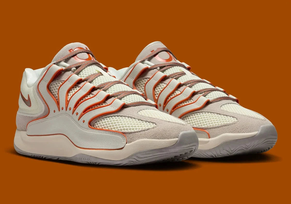 Sneaker de basketball Nike KD 18 Rise en mesh technique multicouche avec amorti Zoom Air et semelle à traction multidirectionnelle.