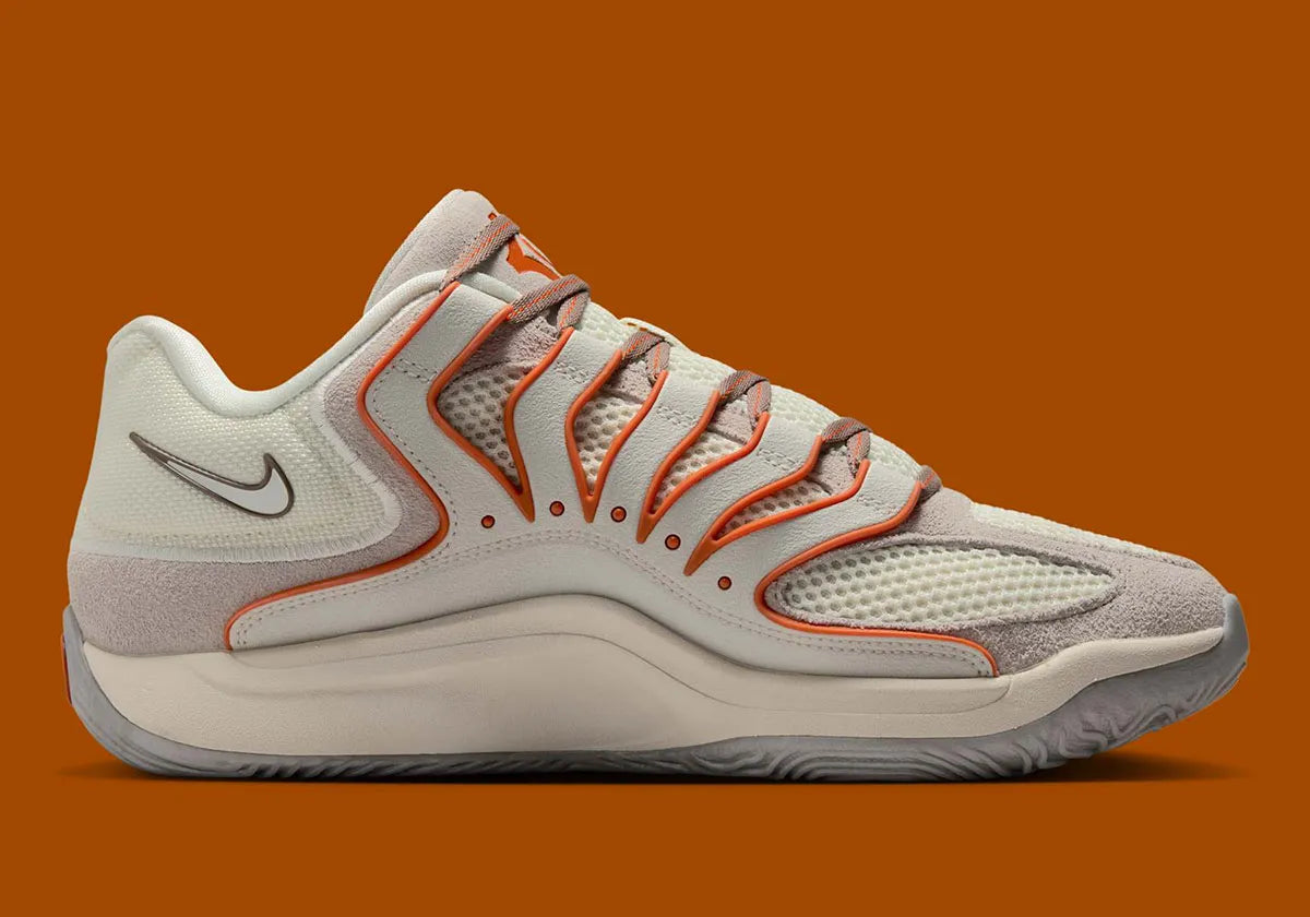 Sneaker de basketball Nike KD 18 Rise en mesh technique multicouche avec amorti Zoom Air et semelle à traction multidirectionnelle.