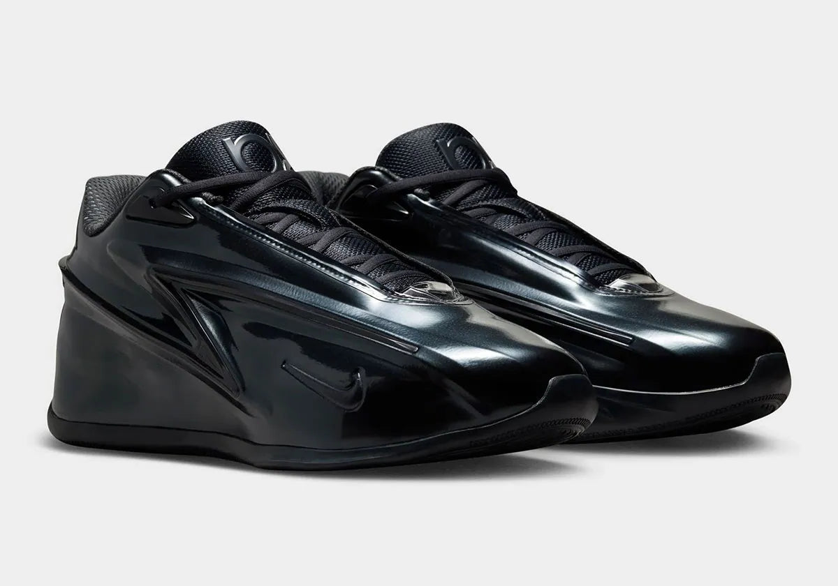 Nike KD 19 Candy Paint Black, chaussure de basketball signature Kevin Durant à dominante noire avec détails Candy Paint et silhouette performance.