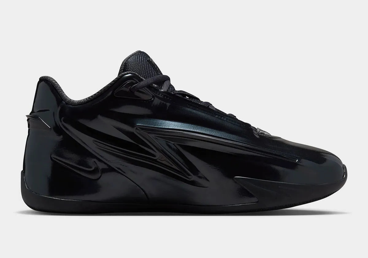 Nike KD 19 Candy Paint Black, chaussure de basketball signature Kevin Durant à dominante noire avec détails Candy Paint et silhouette performance.