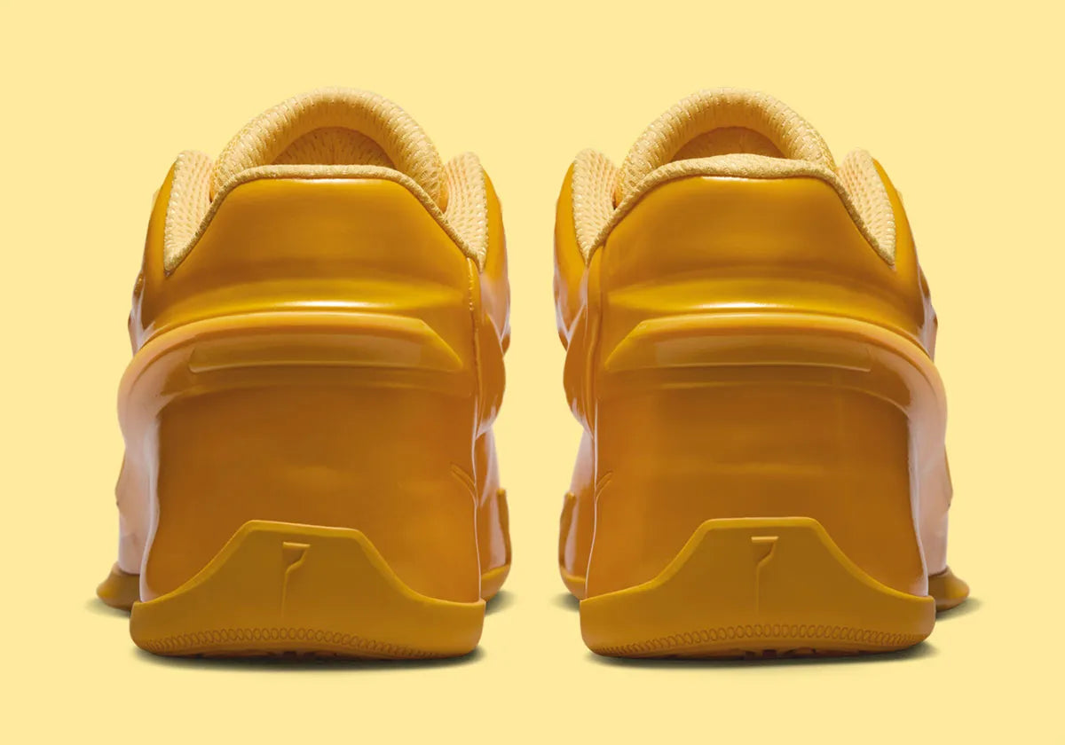 Nike KD 19 Butter Candy, chaussure de basketball signature Kevin Durant au coloris Butter Candy avec silhouette technique orientée performance.