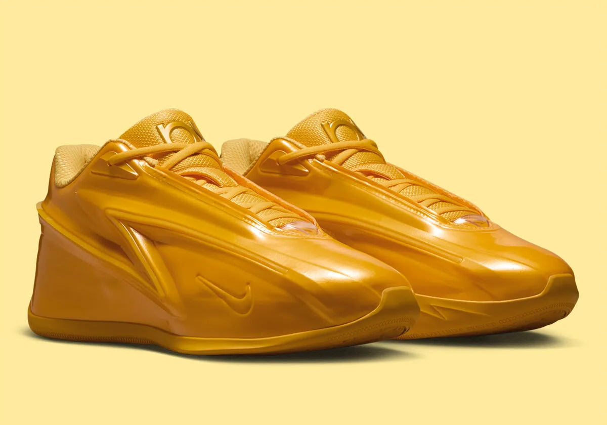 Nike KD 19 Butter Candy, chaussure de basketball signature Kevin Durant au coloris Butter Candy avec silhouette technique orientée performance.