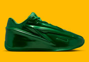 Nike KD 19 Candy Paint Green en Gorge Green et Stadium Green avec tige moulée brillante, détails University Gold et semelle basketball.