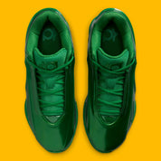 Nike KD 19 Candy Paint Green en Gorge Green et Stadium Green avec tige moulée brillante, détails University Gold et semelle basketball.