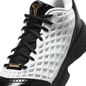 Nike Kobe 3 Low Protro blanche noire et dorée en mesh technique avec amorti Zoom Air et détails Metallic Gold premium. zoom avant de la chaussure