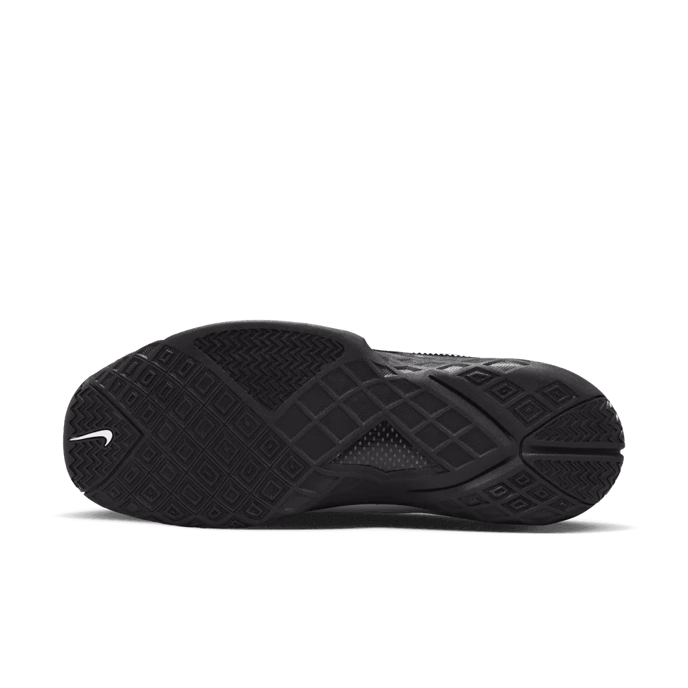 Nike Kobe 3 Low Protro blanche noire et dorée en mesh technique avec amorti Zoom Air et détails Metallic Gold premium. vue semelle