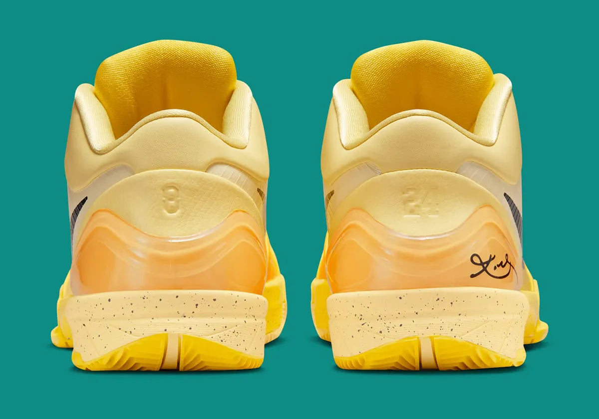 CHAUSSURE KOBE 4, COULEUR JAUNE DE CHEZ NIKE SORTIE EN ETE 2025, LA PAIRE EST PARFAITE POUR LE BASKET BALL, VUE DE L'ARRIERE 