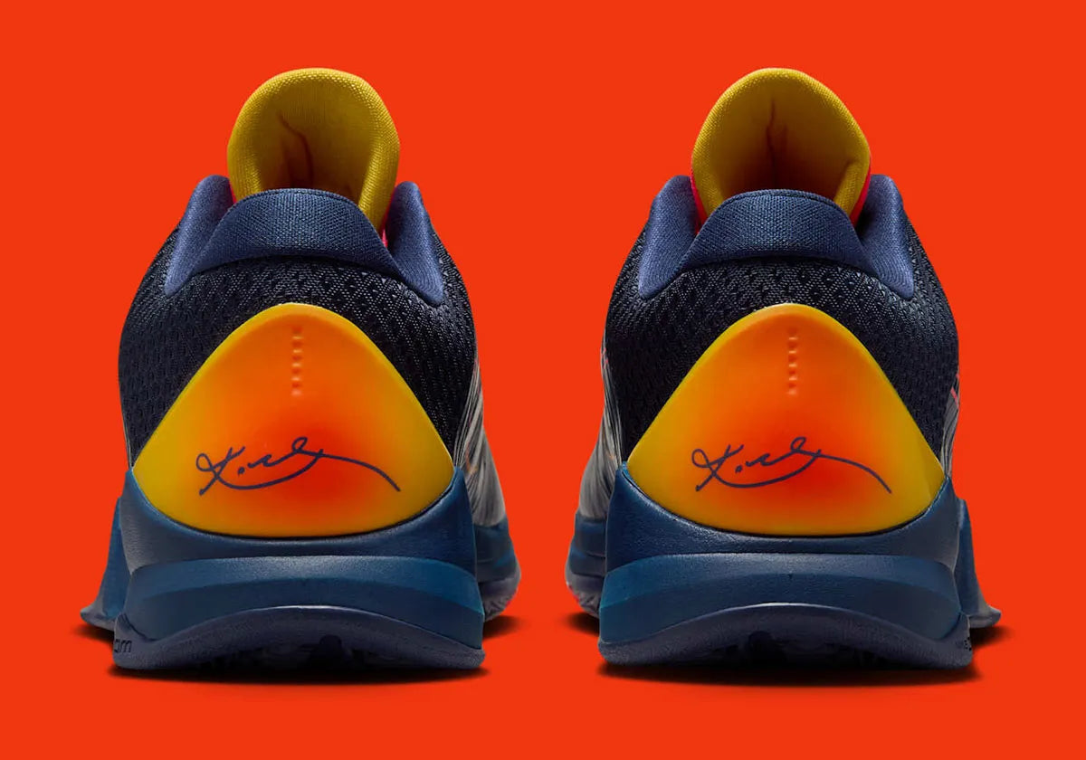 Sneakers Nike Kobe 5 Protro Caitlin Clark Indiana Fever en mesh technique bleu marine avec accents jaunes et amorti Zoom Air réactif.