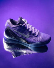 Sneakers Nike Kobe 9 Elite Low Protro en Flyknit hautement technique avec amorti Zoom Air réactif et adhérence multi-directionnelle premium.Vue de coté 