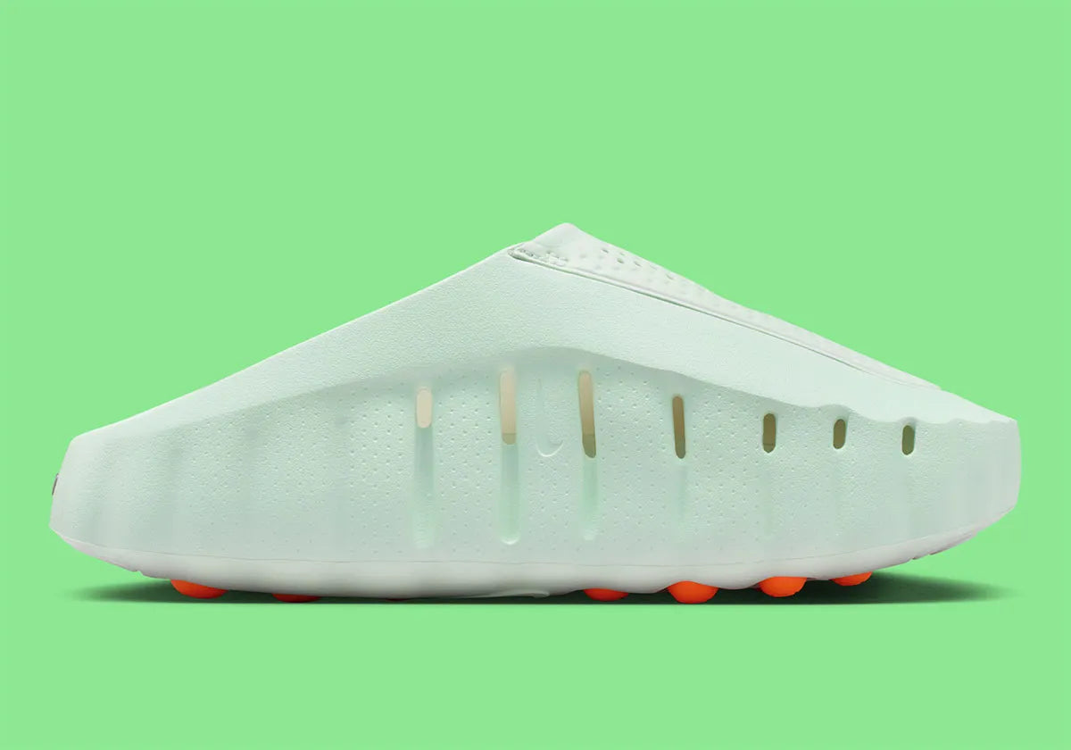 Nike Mind 001 Barely Green Hyper Crimson Black Chrome, sneaker Nike aux teintes vert pâle, orange, noir et chrome avec design moderne et finitions premium.